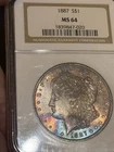 1887 Morgan Pretty Toned Silver 1$ NGC MS 64 Wow!