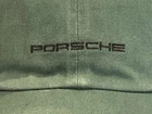2026 PORSCHE DESIGN FANWEAR 100% COTTON DK GREEN HAT W/EMBROIDERED PORSCHE LOGO.
