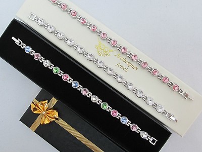 ATEMBERAUBENDES DAMEN KRISTALL MAGNETISCHES HEILARMBAND/ARMREIF/SCHMERZLINDERUNG/SILBER 