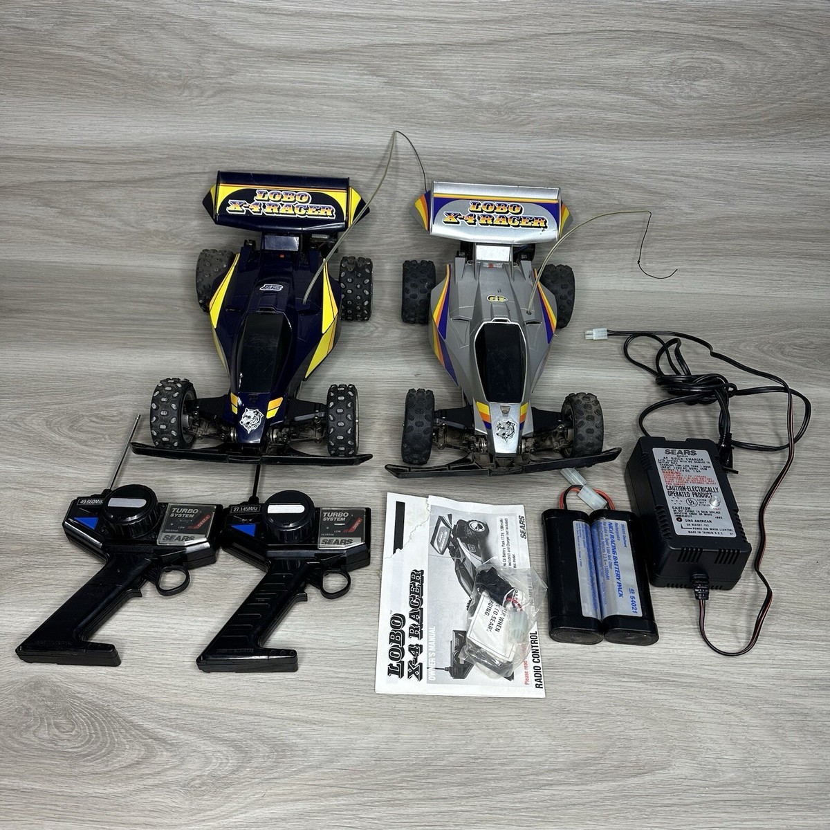 2) Sears Nikko Lobo X4 Racers RC Car-Works! With Transmitters