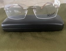 Persol Frameless Eyeglasses With Light Gold Arms In Case