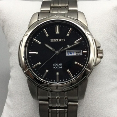 Seiko Solar Watch Men 39mm Silver Tone Black Round Dial Day