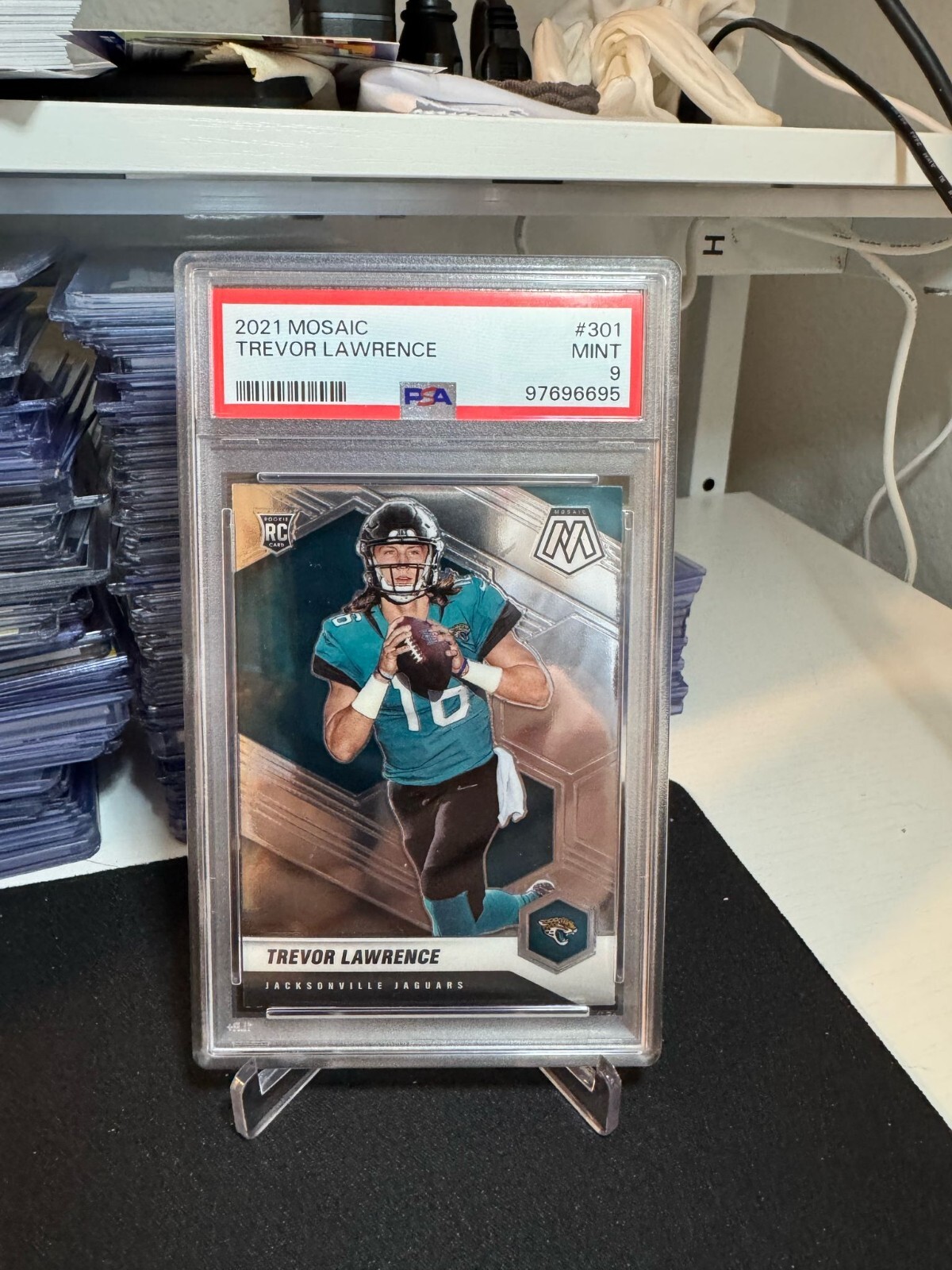 2021 Panini Mosaic - Rookies Trevor Lawrence #301 (RC) PSA 9