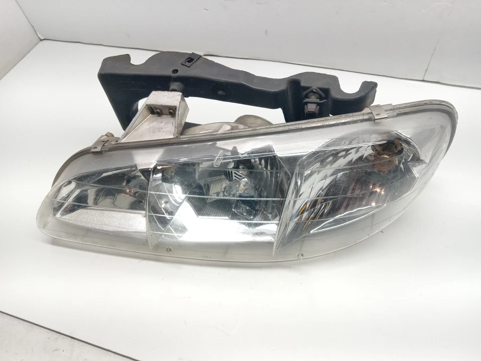 Faro delantero izquierdo del conductor Pontiac Grand Am 1996-1998 OEM, 114-00477 Foto 3 de 4