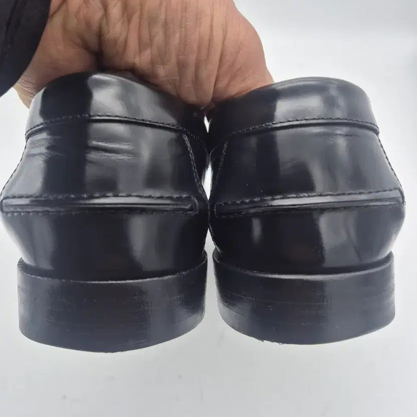 Gucci Black Leather Loafers with Gold Accents 270