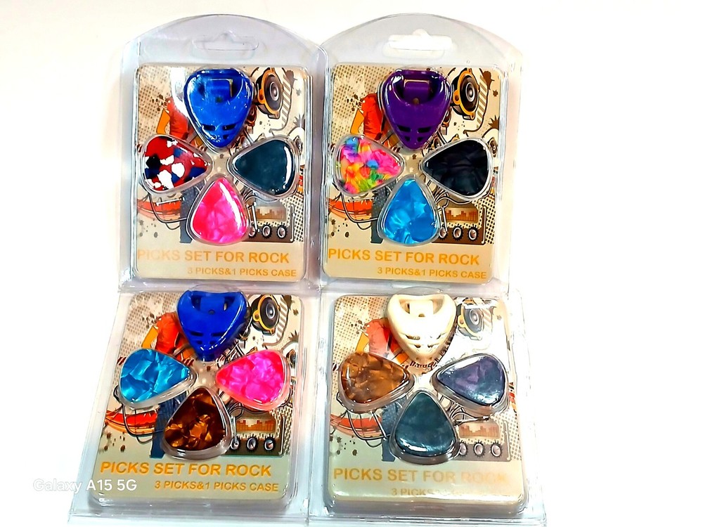 ASSORTED (3) CELLULOID GUITAR PICK AND HOLDER SET