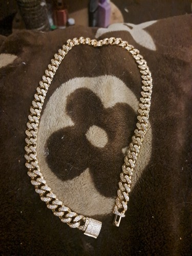 gold cuban link chain with diamonds
