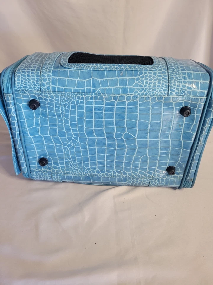 Portador de mascotas con huesos cromados 9" x 16" x 24" color aguamarina Foto 3 de 4