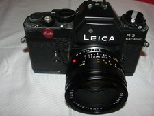 Leica R3 electronic camera with Leitz Summicron R1:2/50 lens with hood  cap