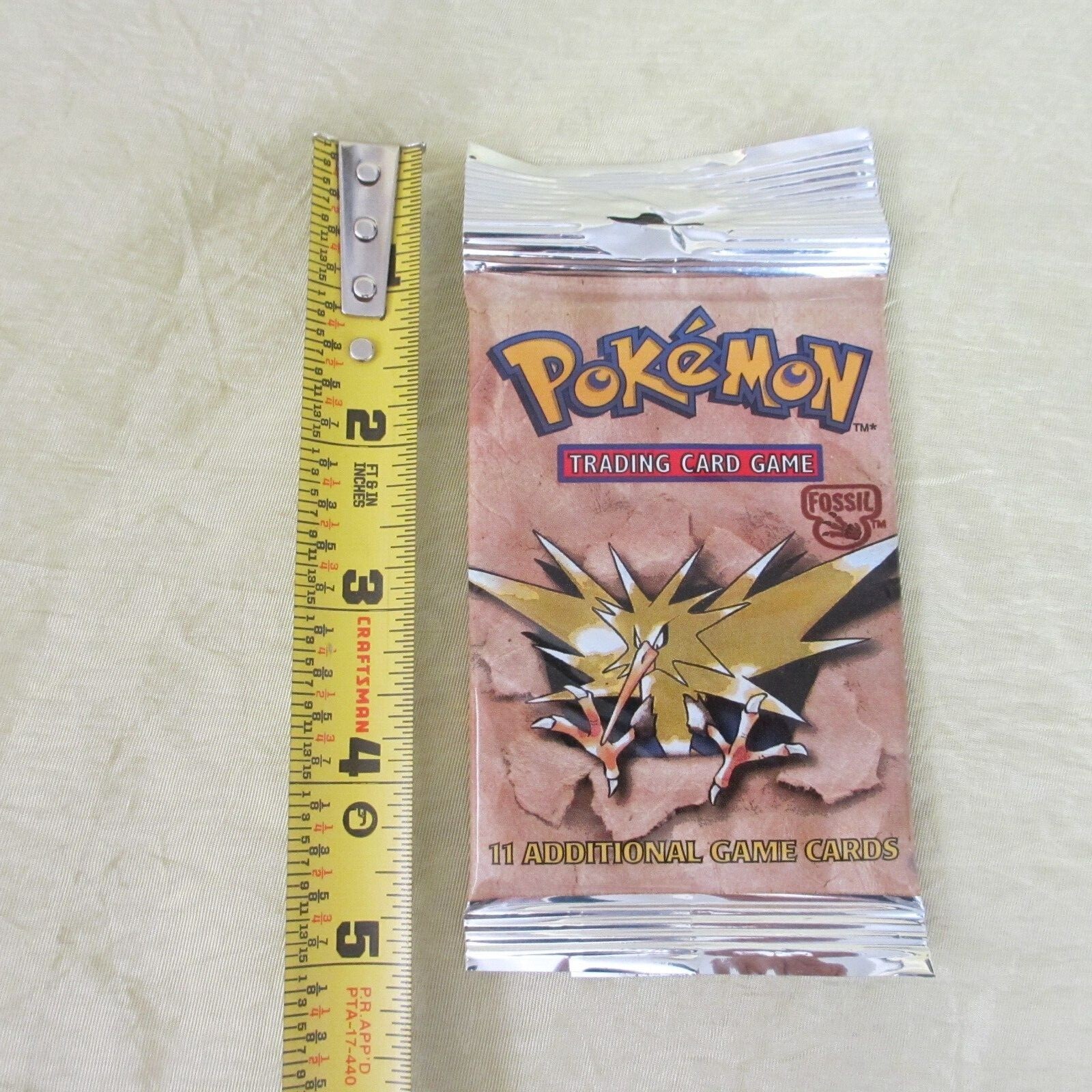 NEW sealed POKEMON 11+ card FOIL pack Fossil WOC06159 Zapdos isbn 1