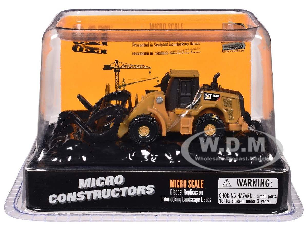 CAT CATERPILLAR 950M WHEEL LOADER (LOG FORK) 