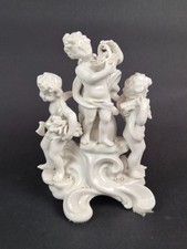 GRUPPO IN PORCELLANA RAFF.PUTTI CAPODIMONTE SEC.XX
