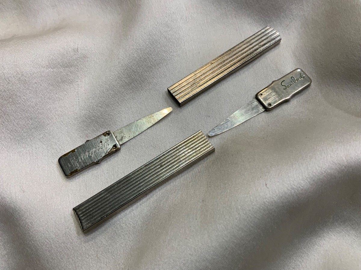 Vintage Mayadent and Sanident silver toothpick marked 835 West