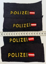 Stoffreste Unterleibchen mit Aufschrift Polizei