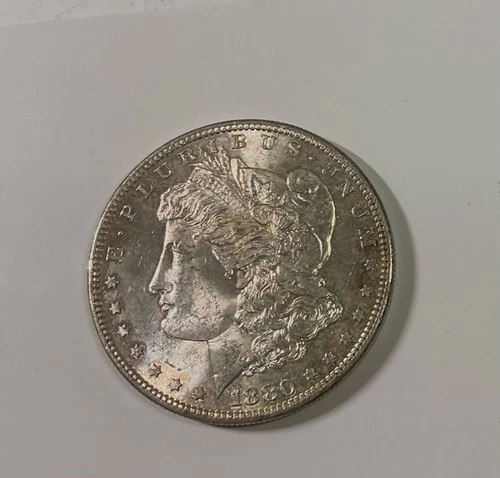 1880 S Morgan silver dollar very pleasing Raw Unc hint of nice colour see pics!