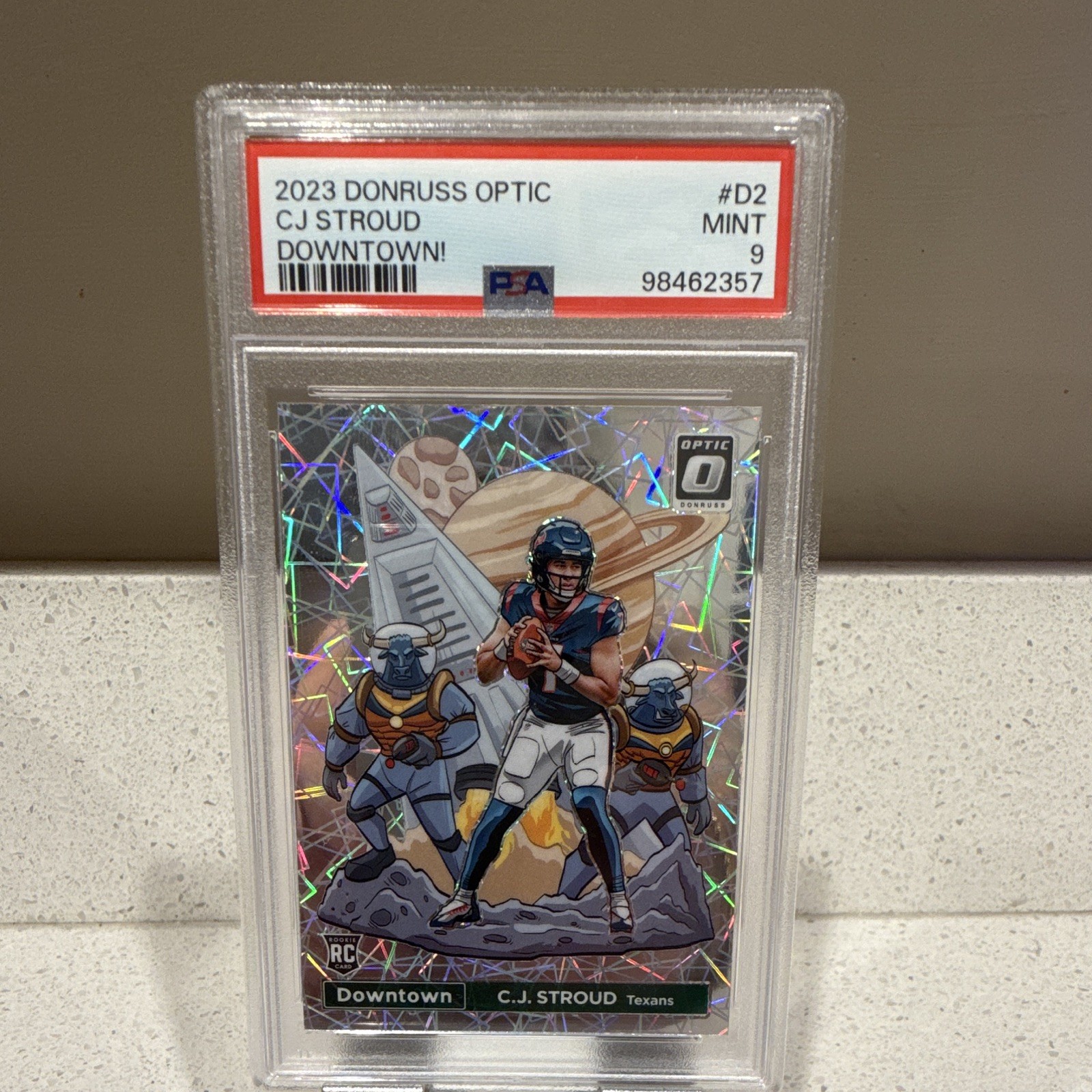 C.J. Stroud #D-2 Football Cards 2023 Panini Donruss Optic Downtown trading card — raw and PSA graded price guide