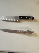ZWILLING Pro Hollow Edge Rocking Santoku Knif...