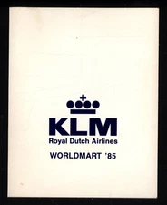 KLM Royal Dutch Airlines WORLDMART '85 * Folder + POLAROID photo LADY in PLANE