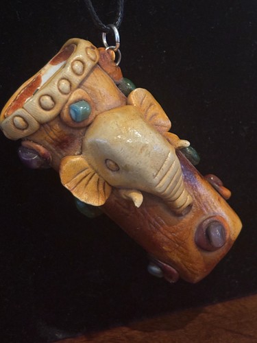 Antique (African?) Pendant with elephant & cactus decorated with natural stones
