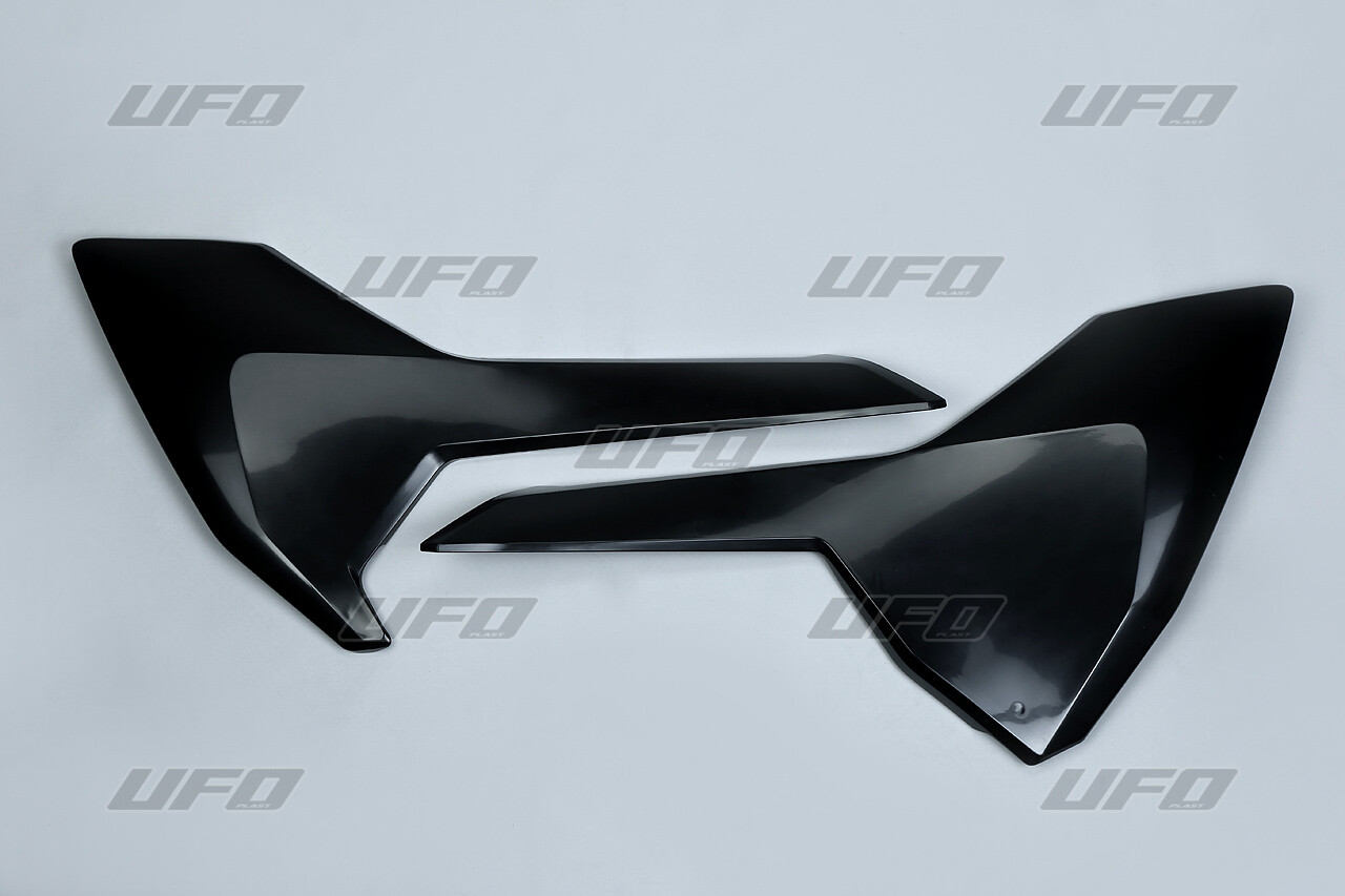 Plaques latérales UFO noires Husqvarna TC85 idéales pour entraînement et course