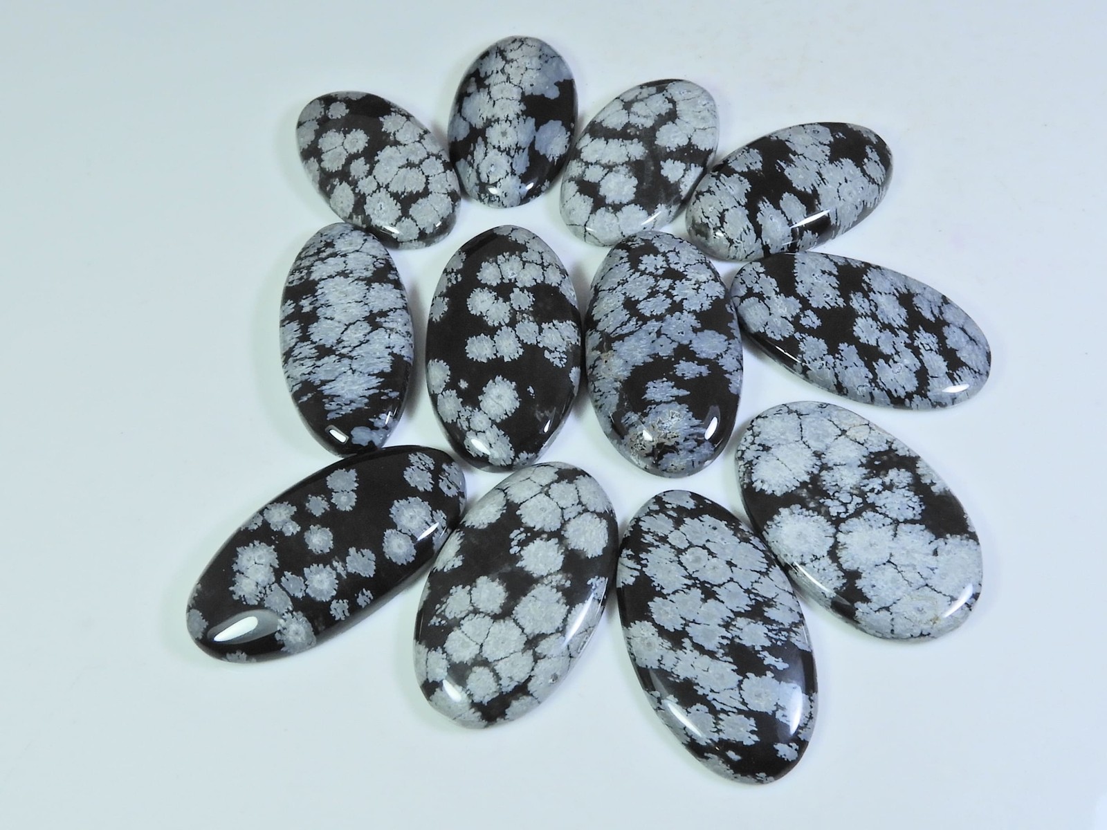 Lote de 12 piezas de piedras preciosas sueltas de cabujón ovalado de obsidian...