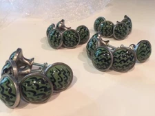 Cabinet door knobs painted sage green & black on brushed nickel base