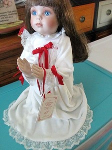 a christmas prayer porcelain doll