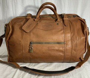 tan leather duffle bag