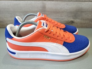 orange and blue puma shoes