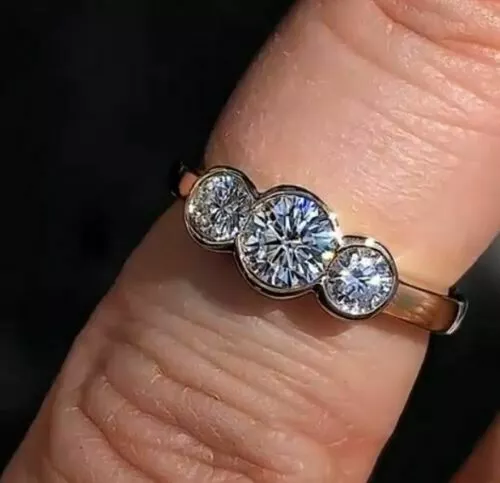 Bezel set three stone ring sale