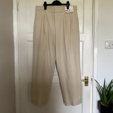 Uniqlo high waist cream cigarette trousers, brand new with tags. Harajuku Tokyo