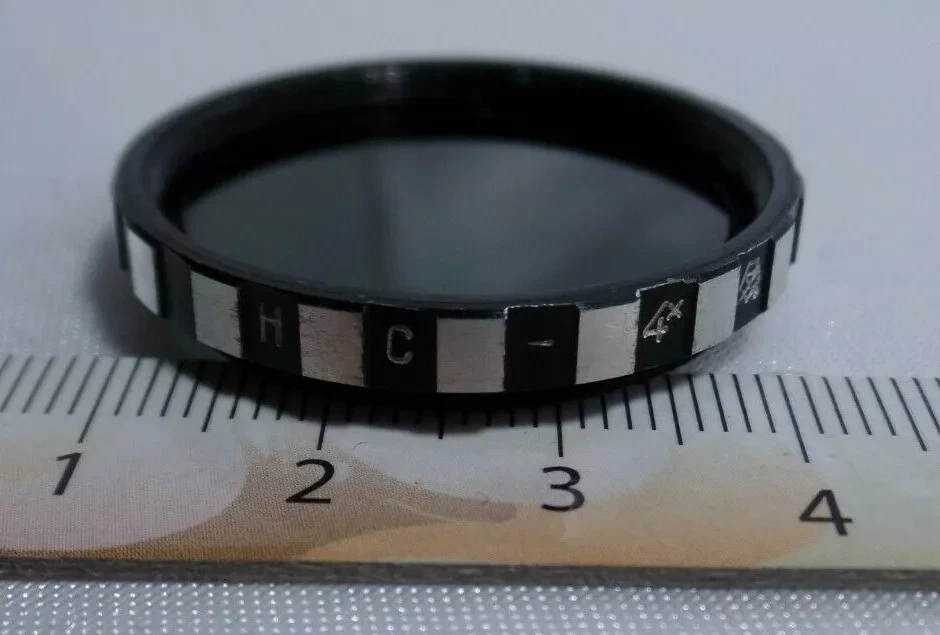a Gray Neutral - 4, 4x 31mm Vintage light filter 31 mm cap for LENS 1821