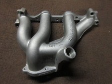 NEU !!!  ABGASKRÜMMER 90412335  ASTRA F  1,7 D  