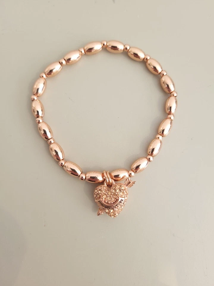 Pulsera Corazón Lazo Cupido Oro Rosa Juicy Couture Edición Limitada Foto 2 de 3