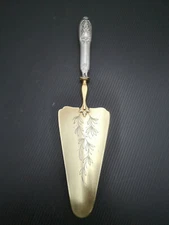 Pelle à tarte, manche en argent Minerve