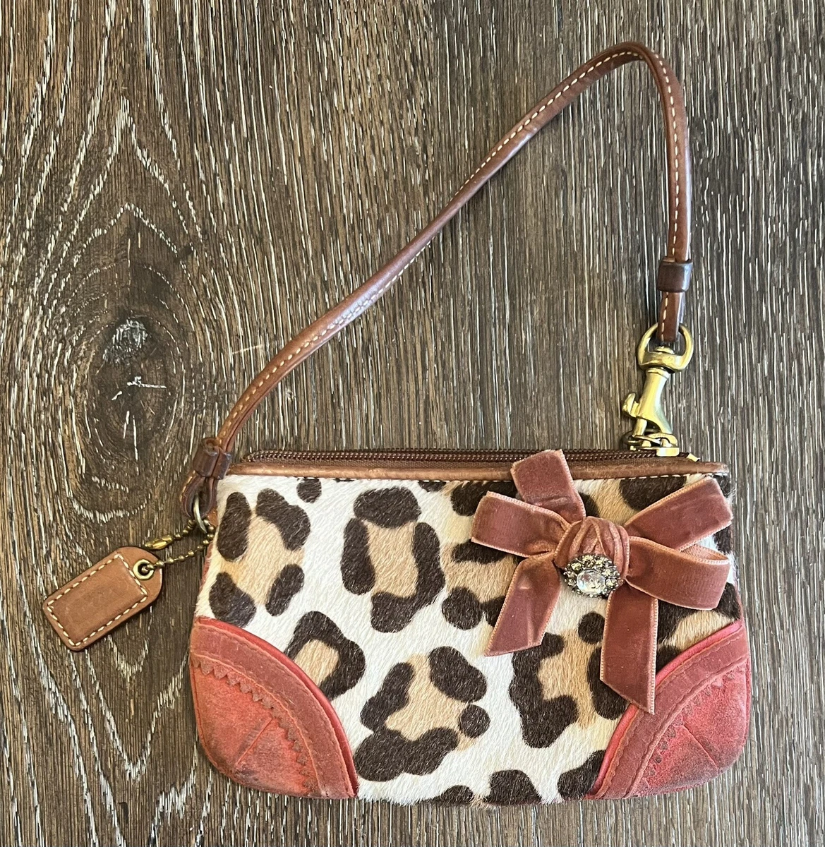 Coach ocelot 2025 wristlet