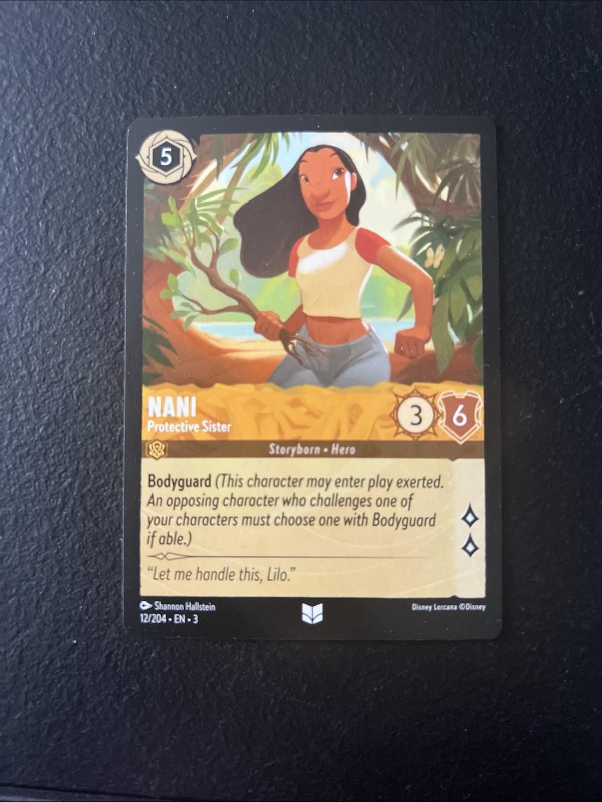 Disney Lorcana TCG Nani Protective Sister 12/204 Regular Into The Inklands ML NM