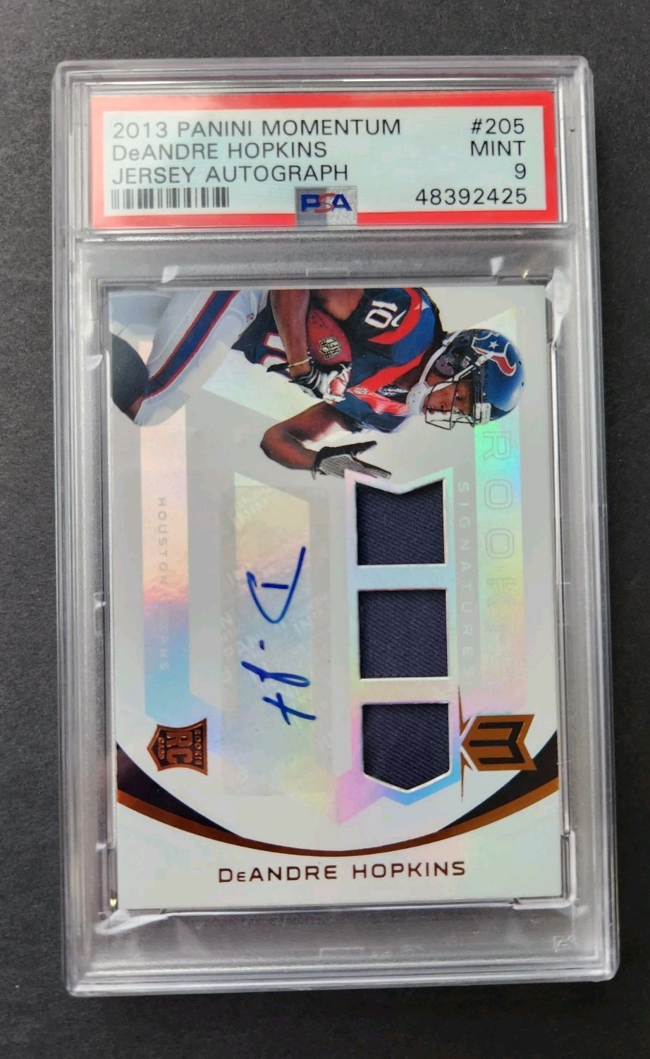 2013 Panini Momentum DeAndre Hopkins #205 Rookie Jersey Auto PSA 9 #/199 Pop 3 view 2