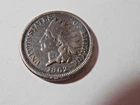 1862 Indian Head Penny in VG condition. Nice rim. partial Liberty & diamonds.