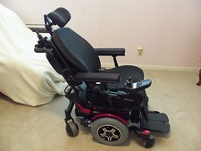 POWER WHEELCHAIR BY QUANTUM RED NEVER USED