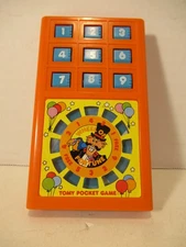 Vintage 1997 TOMY Pocket Game Wheel of Fortune WORKS