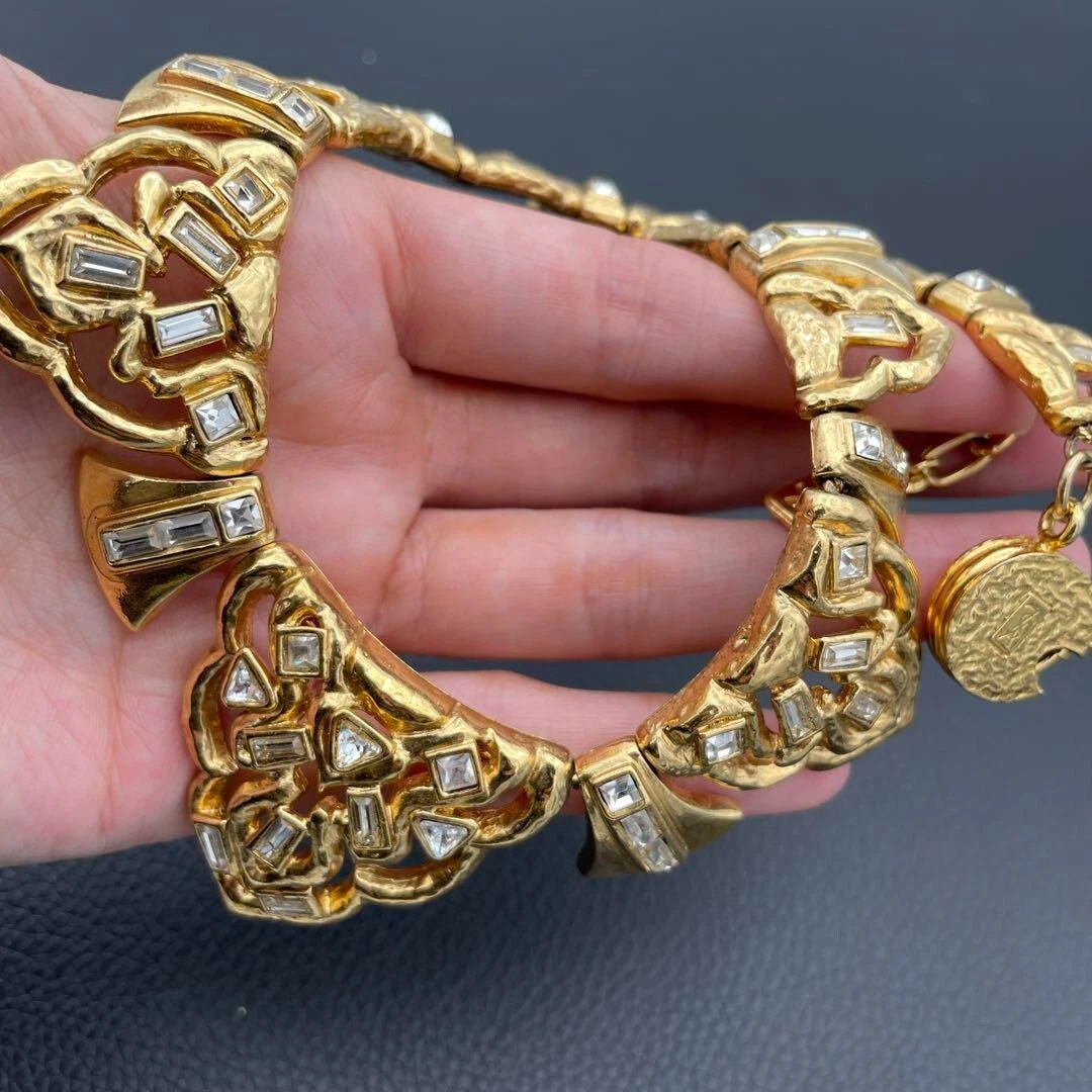 SAINT LAURENT (YSL) Collana Yves Saint Laurent YSL girocollo colore oro vintage USATA