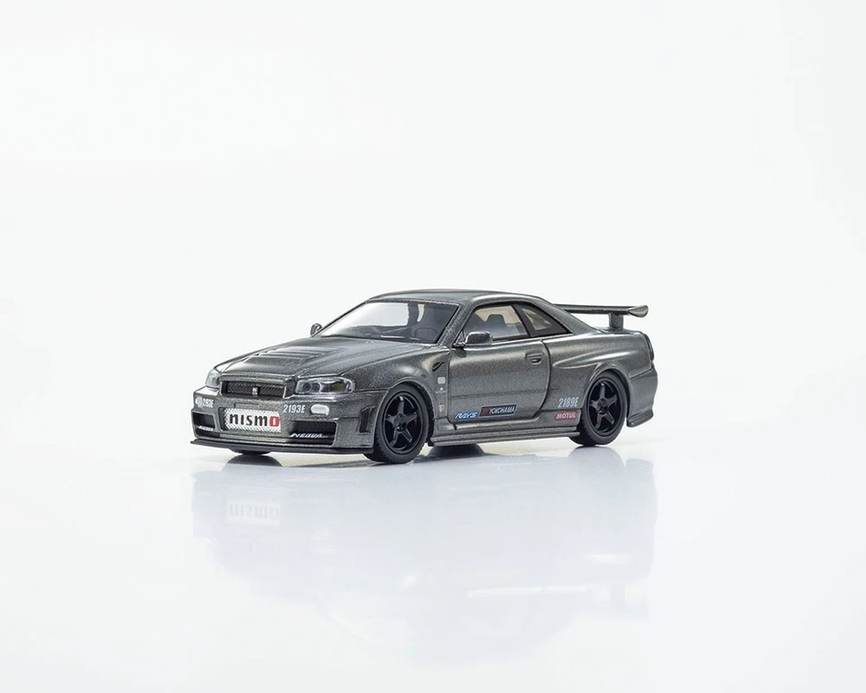 Kyosho Nissan GT-R NISMO BNR34 Versión CRS con Base LED MOTN Compatible Gris 1/64 Foto 2 de 4