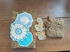 lot of crochet items three pot holders , crocheted flowers,  2 net  tablecloths — photo 1