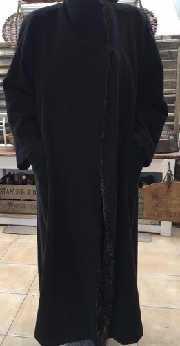 faux fur detail, extra long black coat 