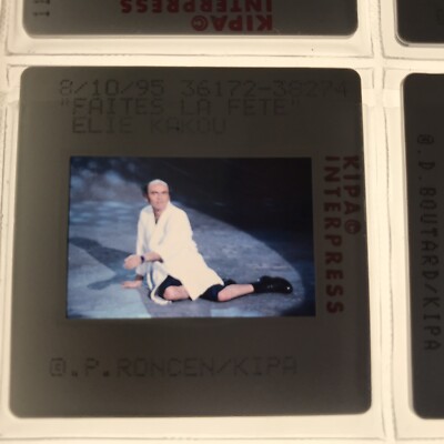 ELIE KAKOU - PRESS SLIDE