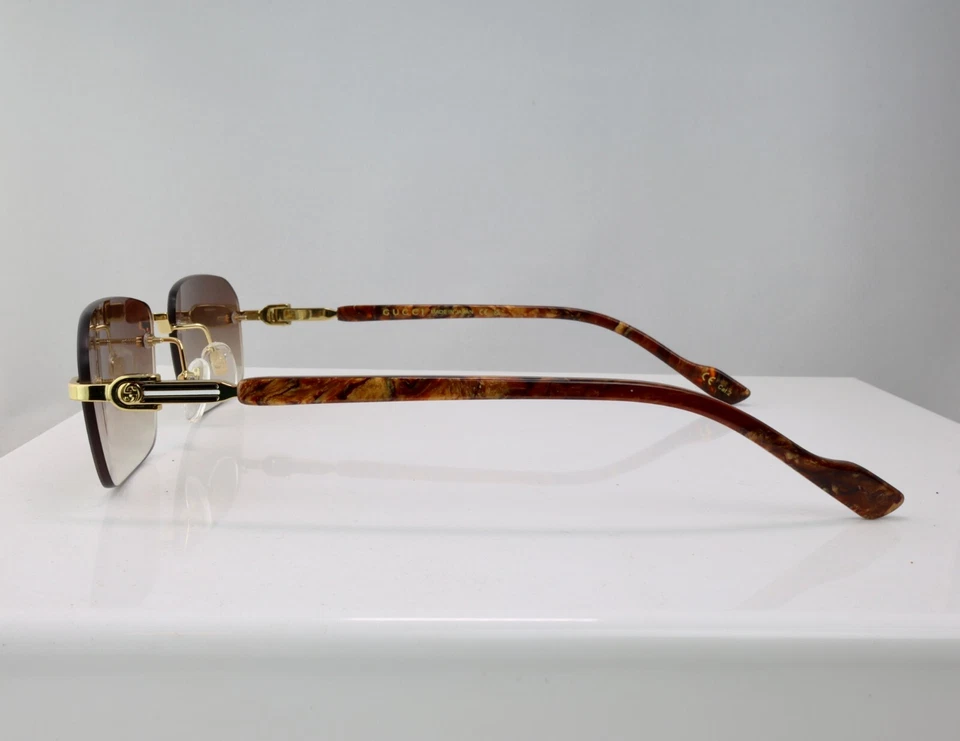 Gafas de sol Gucci GG1221S 004 56 mm cuadradas sin montura doradas con lente con logotipo marrón Foto 4 de 4