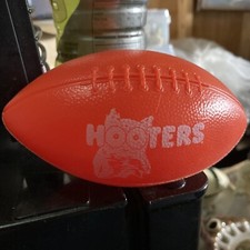 Hooters Vintage plastic football 6  across 9 1/2  round middle