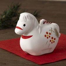 Bonne chance cloche porte-bonheur cheval de bon augure