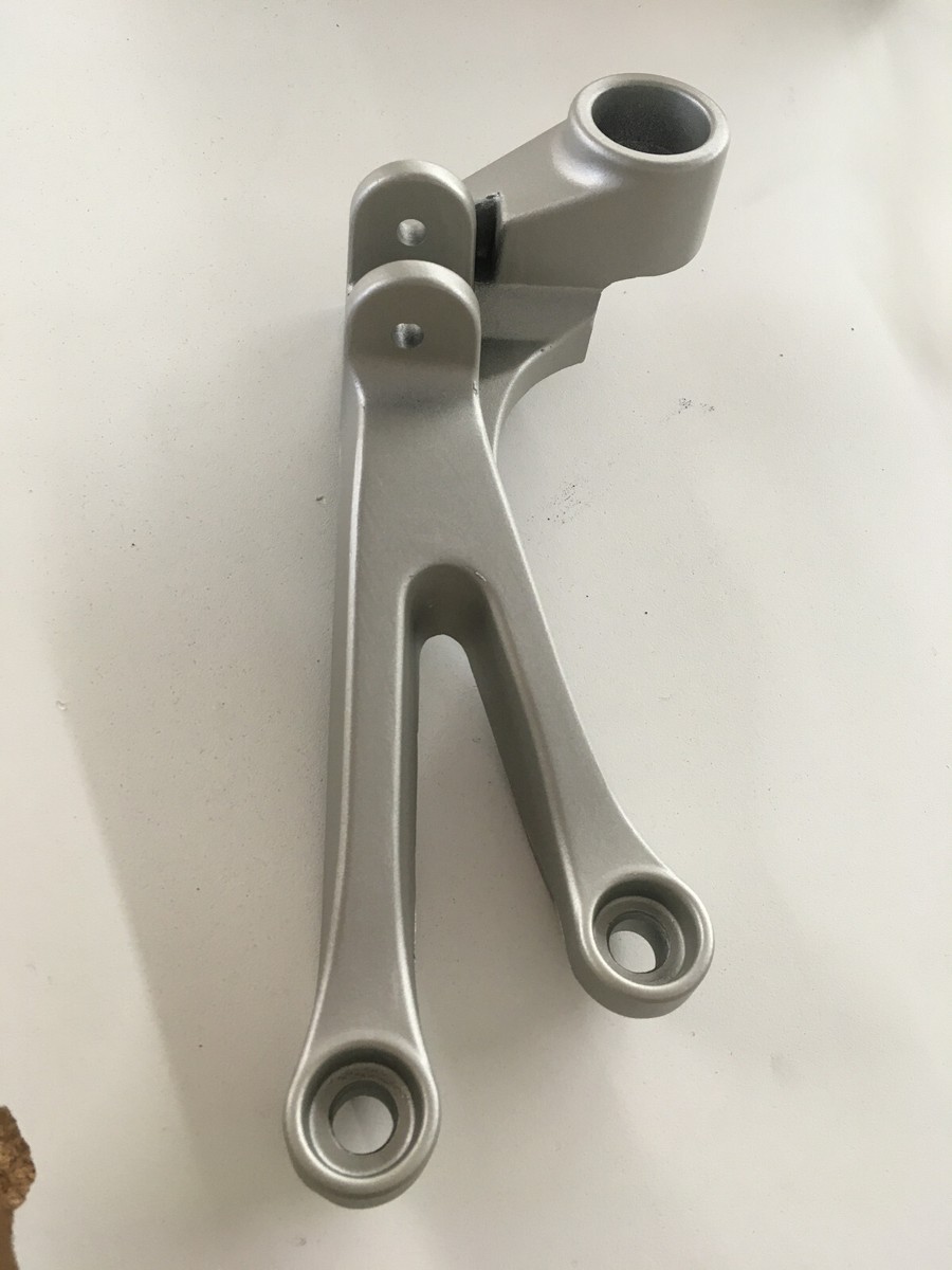 NOS OEM Genuine Kawasaki RIGHT REAR FOOTPEG REST MOUNT P/N 35011